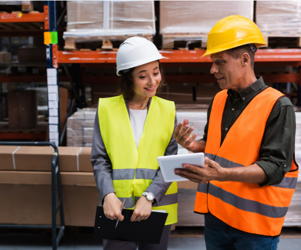 Warehouse workers discussing Logistics